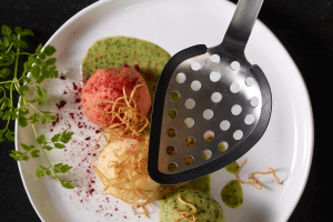 Cuillère ajourée Rosle en acier inoxydable et silicone