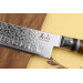 Couteau santoku alvéolé Kutoyama 17cm damas manche pakka et anneaux acryliques