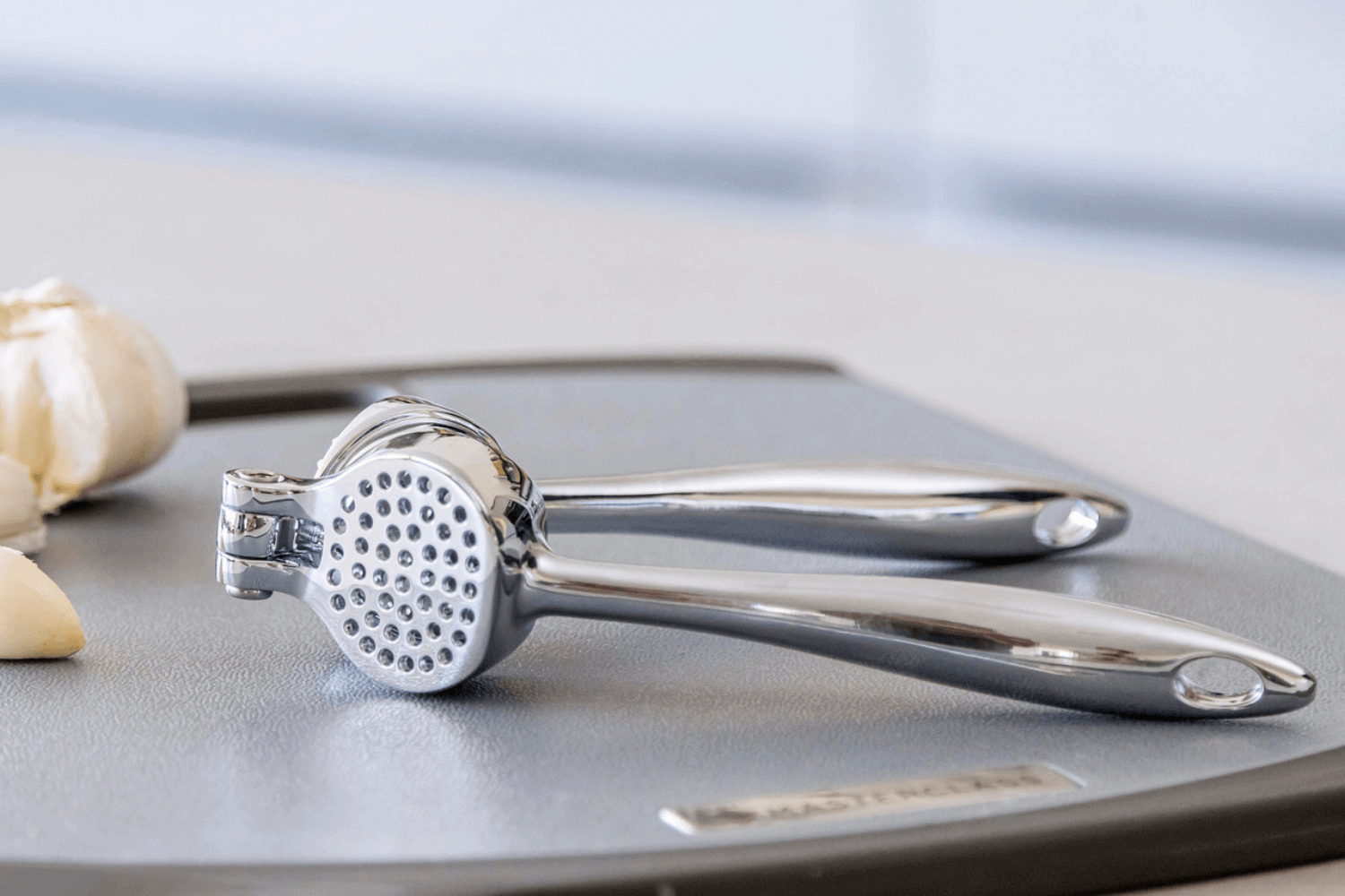 Presse-ail Professionnel 2en1 Rösle - Racloir Intégré