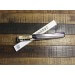 Couteau Takohiki japonais artisanal JIKKO Tokusei lame 24cm Nihon Steel manche magnolia gravé