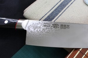 Couteau de chef japonais Kanetsugu Saiun 20cm damas 65 couches