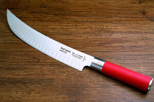 Couteau à découper Hektor DICK Red Spirit acier inox lame alvéolée 25cm manche rouge