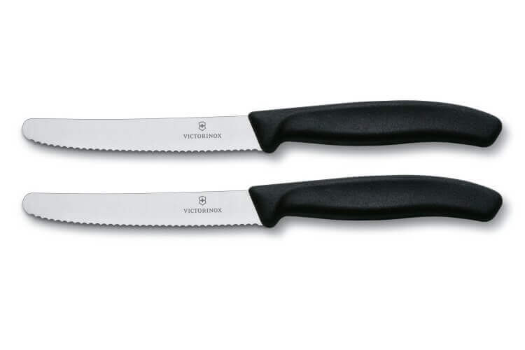 2 couteaux de table Victorinox lame 11cm à dents bout rond manche noir