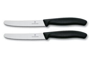 2 couteaux de table Victorinox noirs lames crantées 11cm bout rond