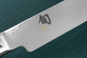 Couteau à trancher japonais Kai Shun Classic White damas 33 couches 23cm
