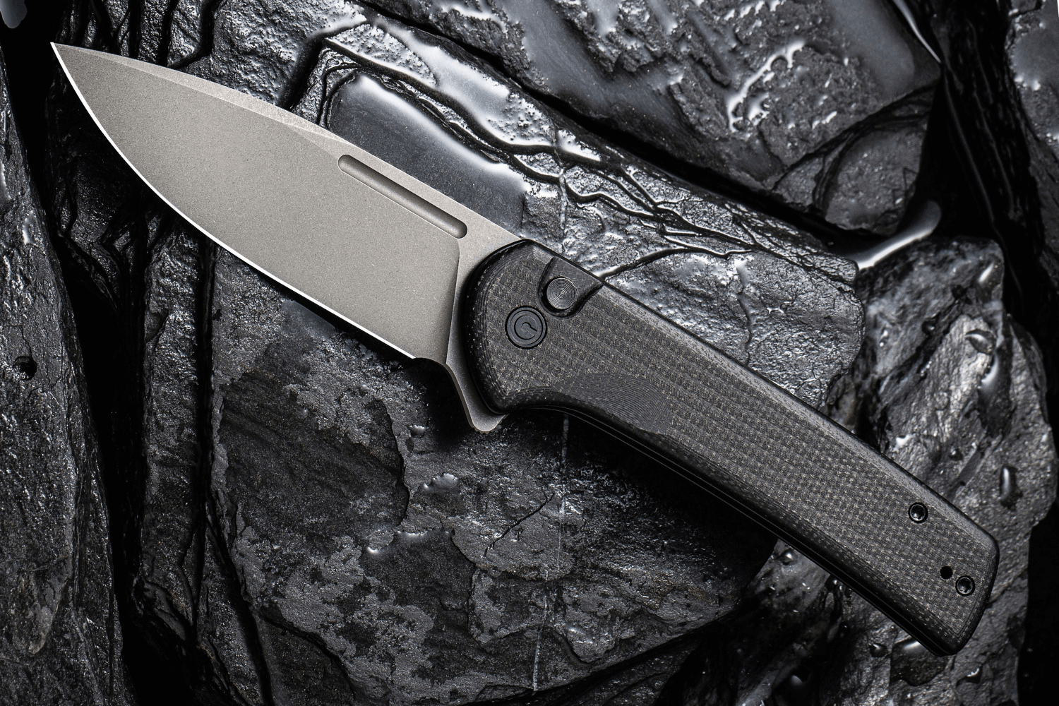 https://cdn.couteaux-du-chef.fr/81577/couteau-pliant-civivi-conspirator-c210061-manche-micarta-noir-117mm.jpg